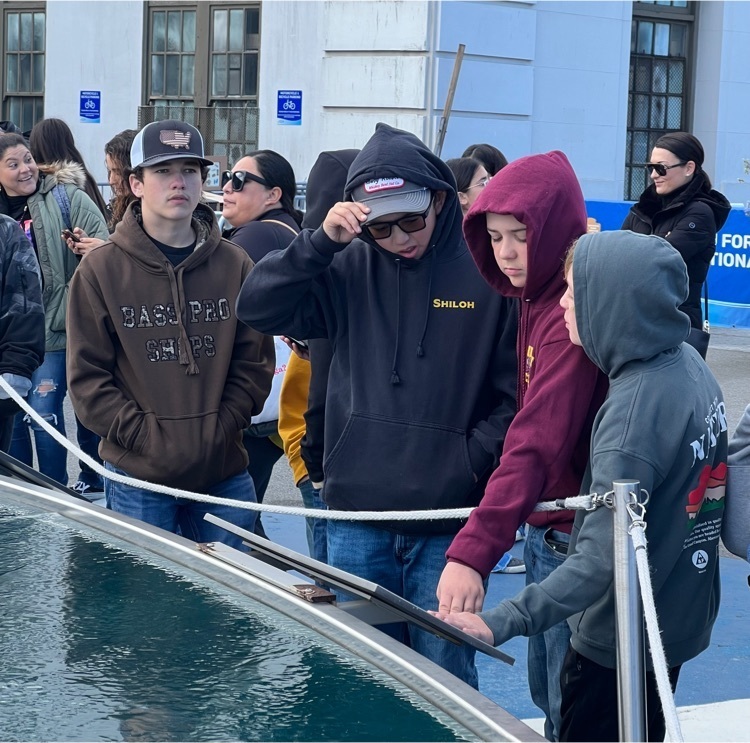 Students studying a model of Alcatraz 
