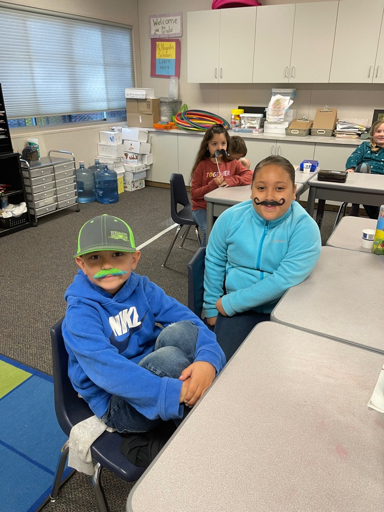 second graders mustache you to read!
